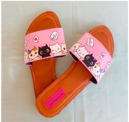 Add a touch of love and playfulness to your feet with Handpainted Juttis - Catty Love. These unique juttis are handpainted with love, making each pair one-of-a-kind.