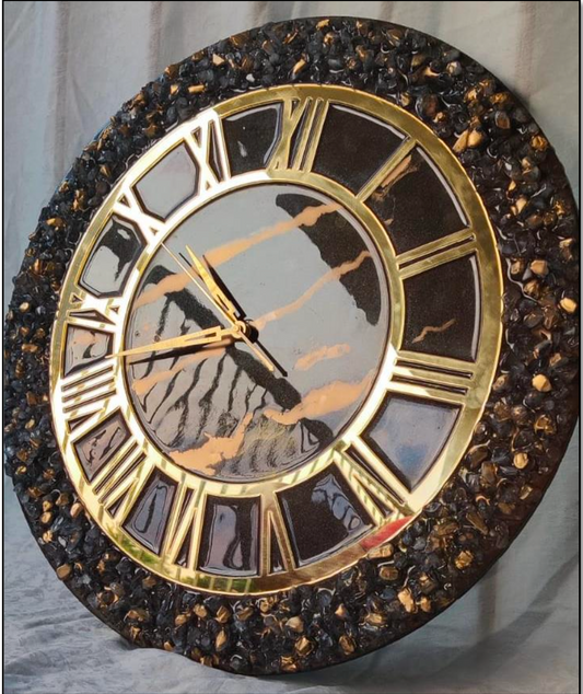 This Dark Chocolate Resin Wall Clock adds a touch of sophistication to any room. Made from high-quality resin, this clock features a dark chocolate color that comple