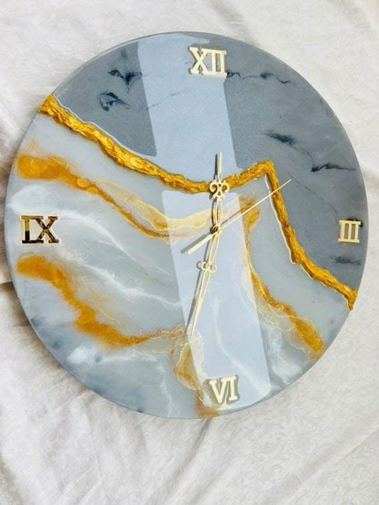 Discover a new level of style with our Resin Wall Clock. The sleek design and 3D effect will elevate any room's aesthetic. Made with premium quality resin and expert